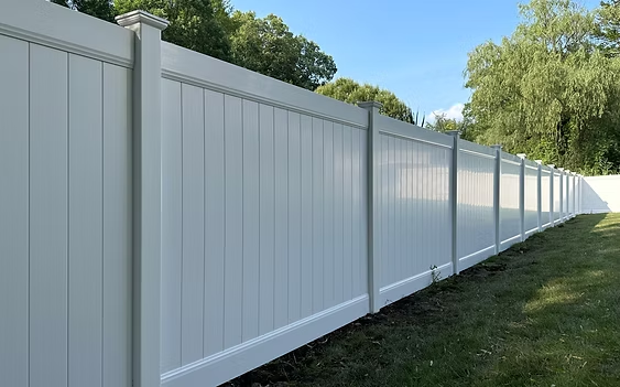 Select Series V100 vinyl privacy fence with smooth white panels in Bergen County, NJ