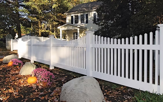 Select Series V201 vinyl picket fence with classic scalloped design near front garden in Essex County, NJ