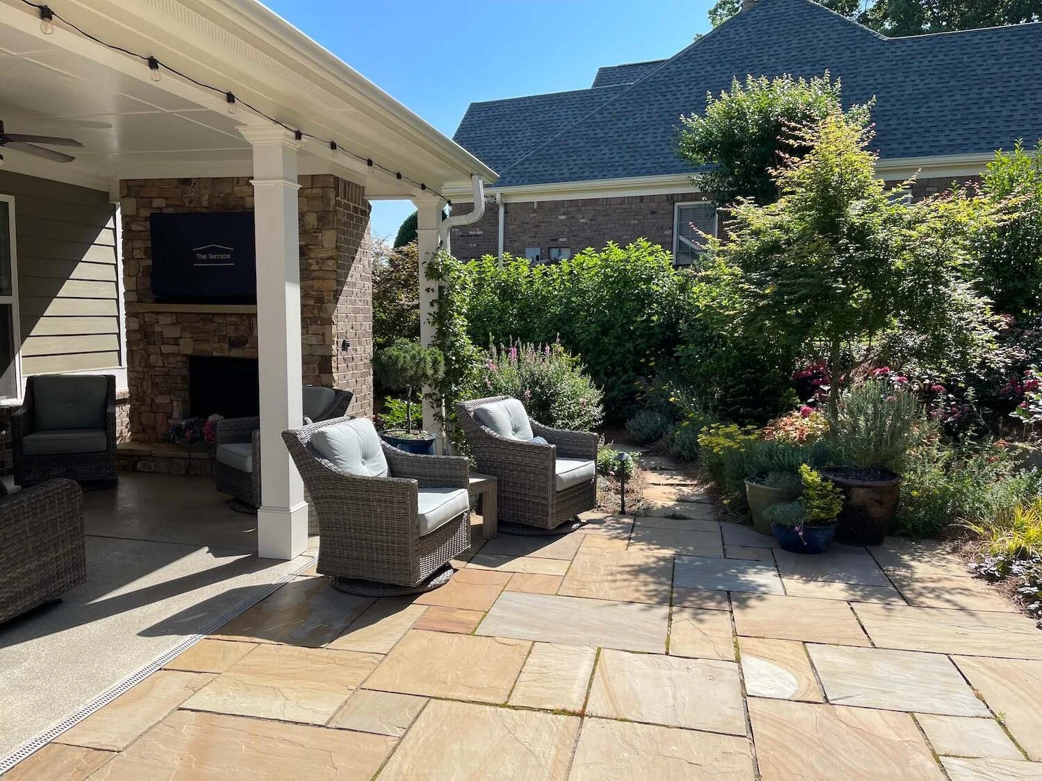 Completed backyard patio installation with clean hardscape layout in Suwanee, GA