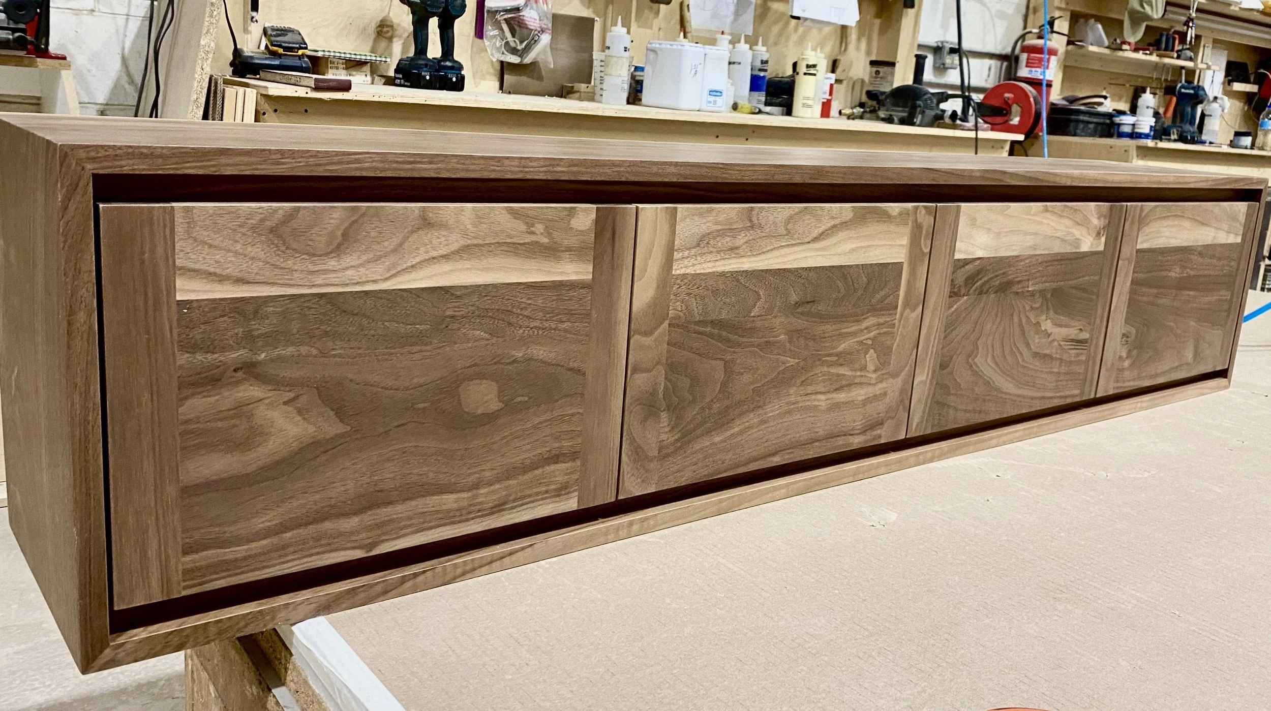 Handcrafted walnut floating entertainment center, Dominic's Woodworking
