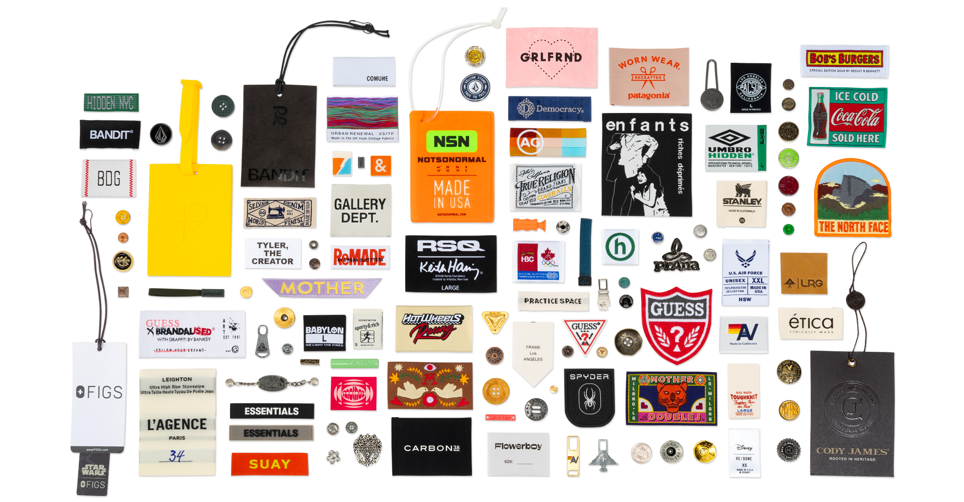 Collection of various fashion brand patches, tags, and accessories displayed on a black background.