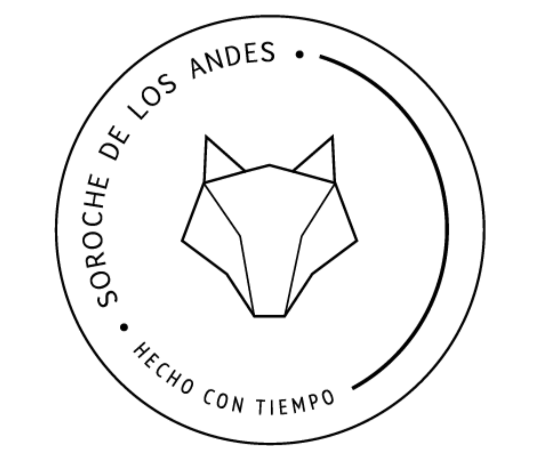 A circular logo featuring a stylized geometric fox head in the center. The text "SOROCH E DE LOS ANDES" surrounds the top of the circle and "HECHO CON TIEMPO" along the bottom.