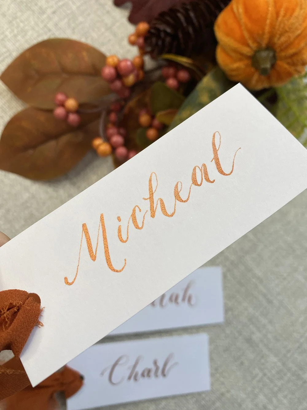 Copper-calligraphy-place-cards-on-white.jpg
