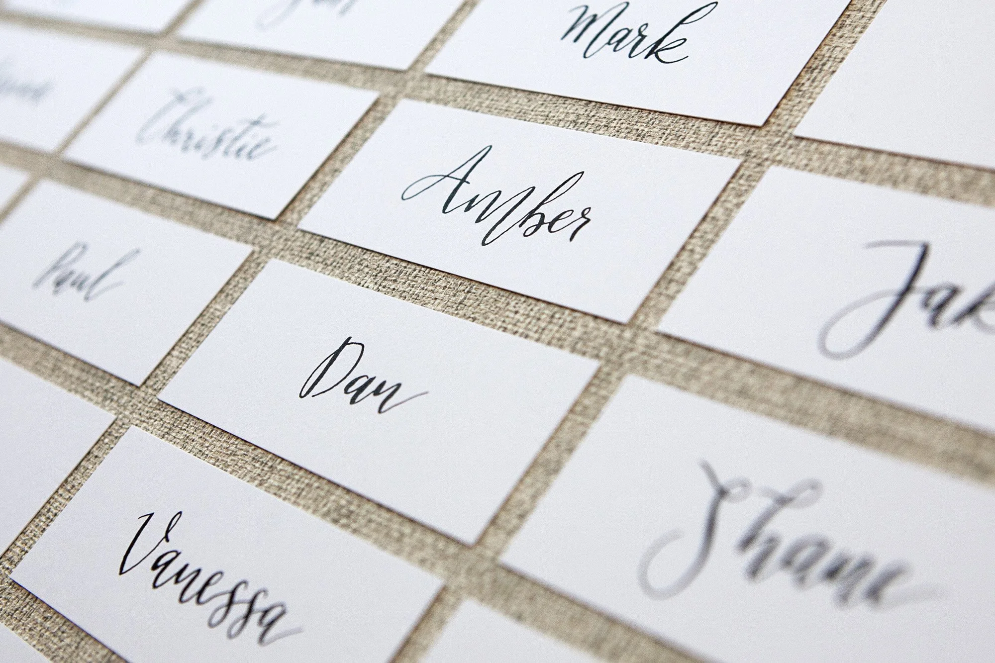 Black-calligraphy-straight-edge-place-cards-on-white.jpg