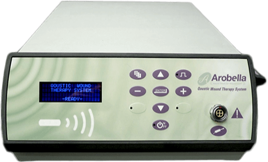A medical device labeled 'Arobella Questic Wound Therapy System' with control buttons, a digital display, and connection ports.
