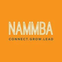 NAMBMA logo with orange background and white text that says 'NAMBMA' and 'Connect Grow Lead'.