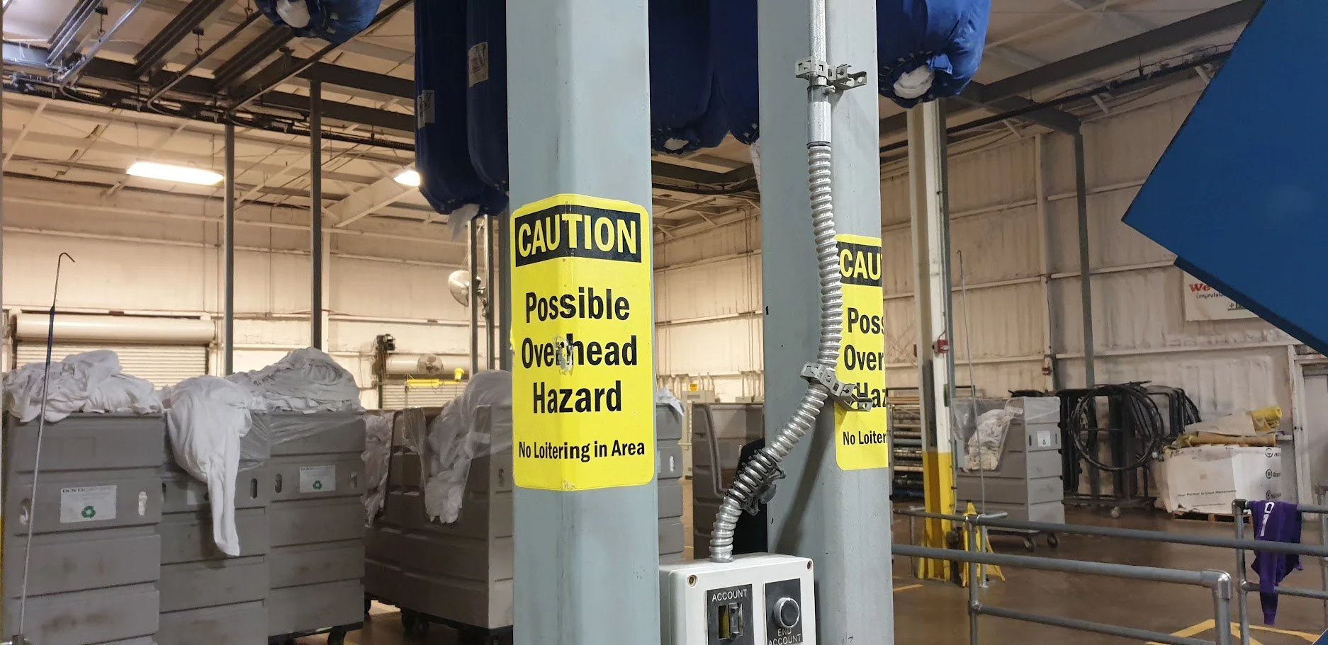 The Hidden Danger Above: Why Safety Guarding Under Overhead Rail Bags Is Critical