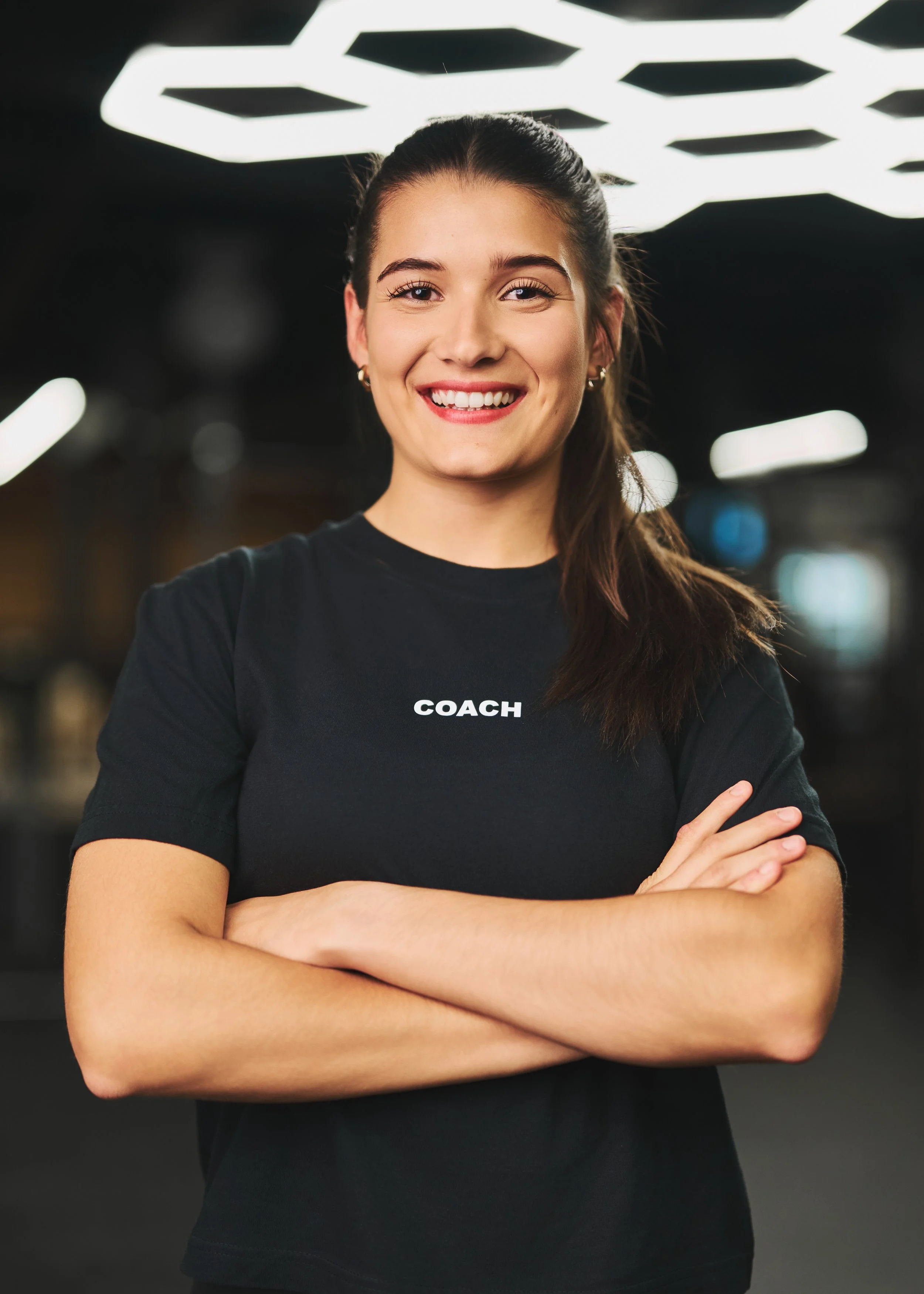 Justine, entraîneur de cours de groupe chez ATHLX