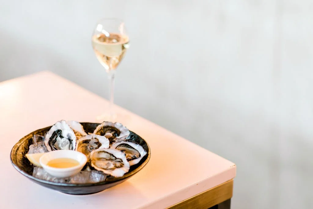 happy hour oyster frenzy complimentary glass of french bubble