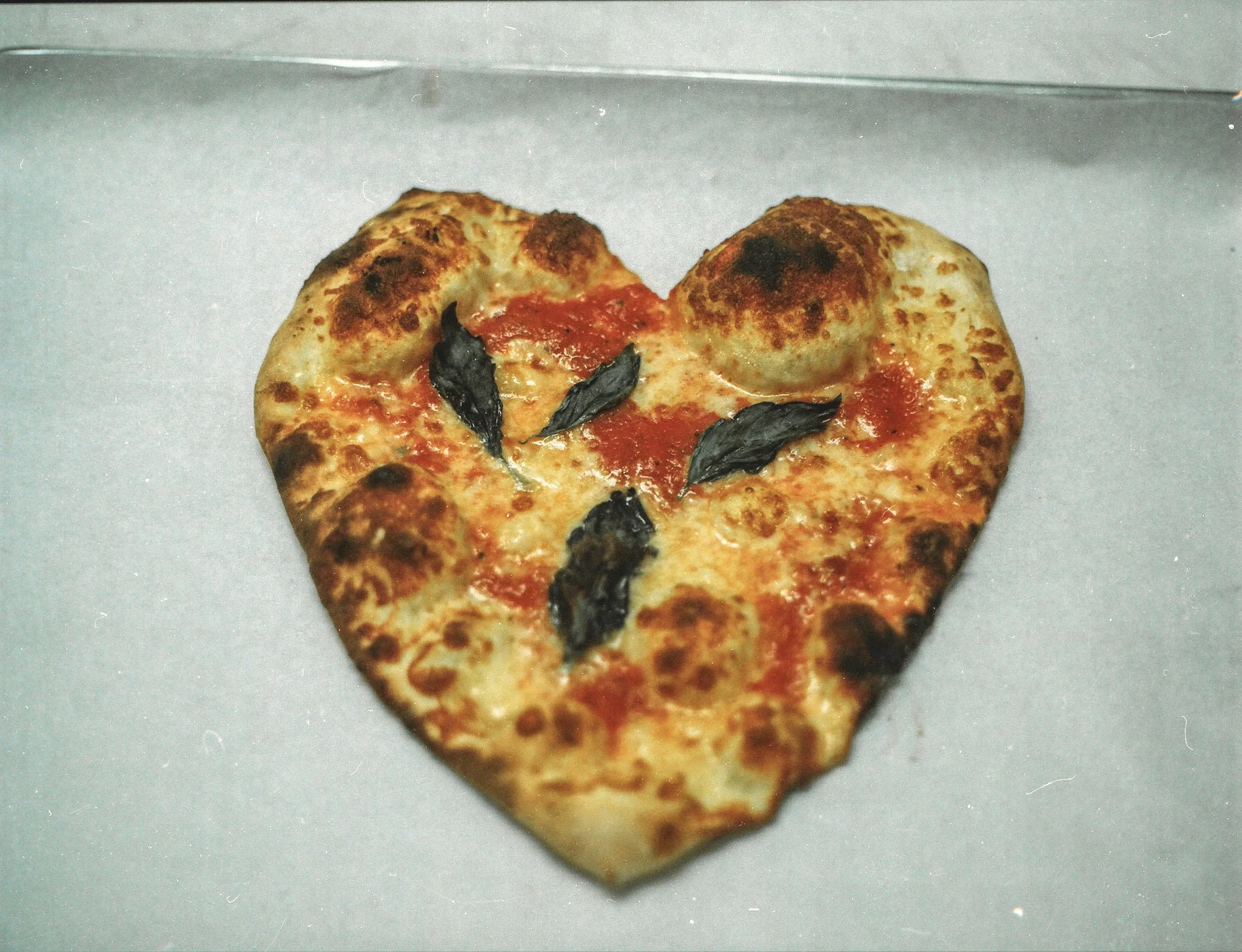 Love, Pizza. ILM, NC '24. (Porta 800.)