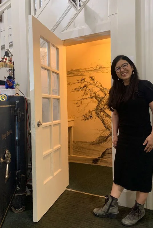 Yucali Seki at the entrance to her installation The Quiet Within in the Phone Booth Gallery