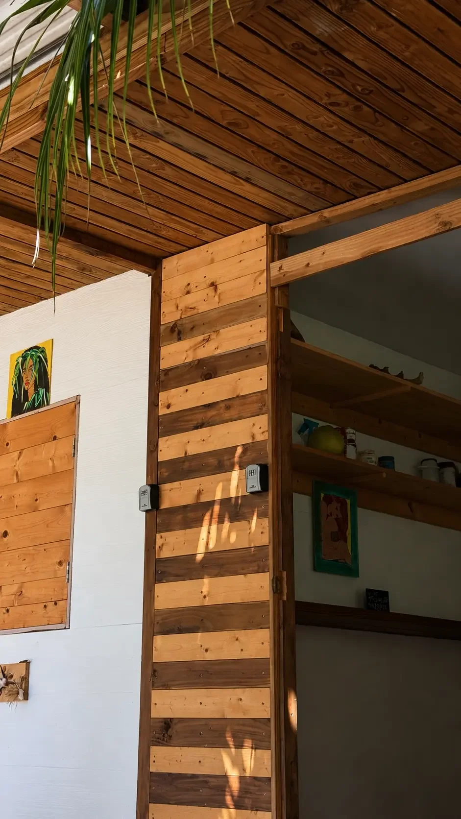 The entry with padlocks for the keys to open the guest house in Rangiroa