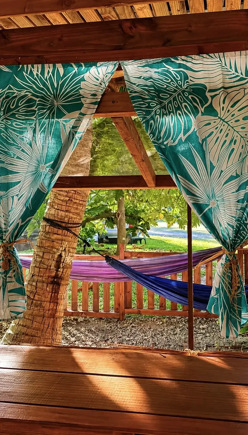 Garden lounge and hamacs in KURA ORA GUEST HOUSE