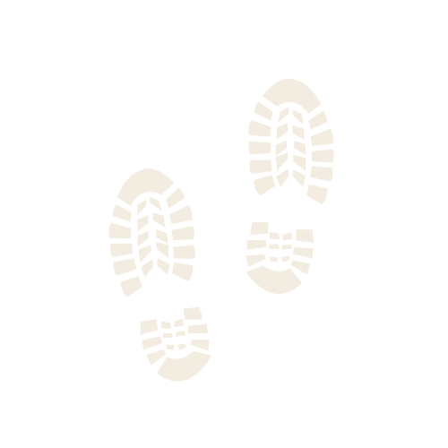 White shoe prints on a black background.