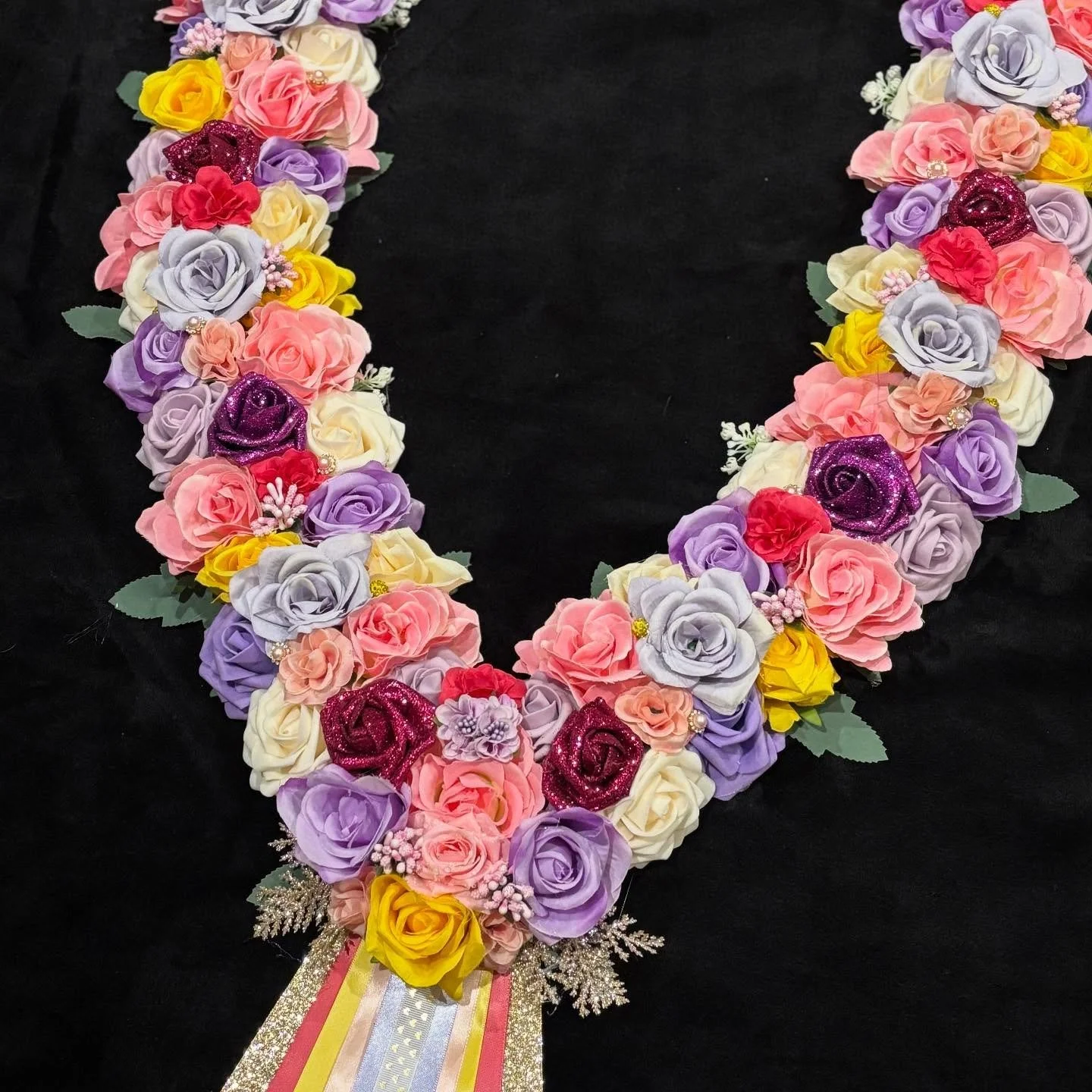 A Double Row Garland heading out to a local show ⭐️

Less flowers and width then our regular Triple Row Garland but just as pretty 😍 

A mix of pink, purple and yellow flowers🌷
Featuring gold and pink embellishments 💍
Light use of leaves and green