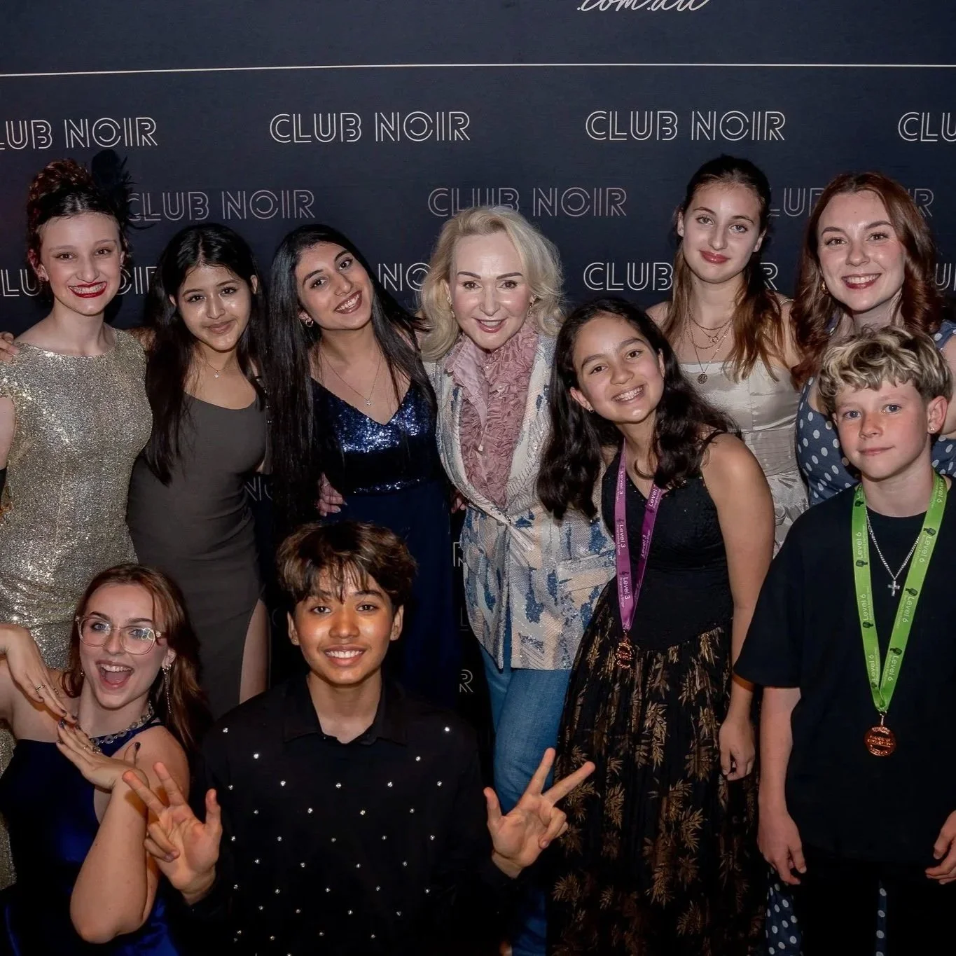 Performance Studios Vocal Coaches Lisa Lockland-Bell, Beth Parr, and Grace Arnell with the Emerging Elite Performance Team, 2026.