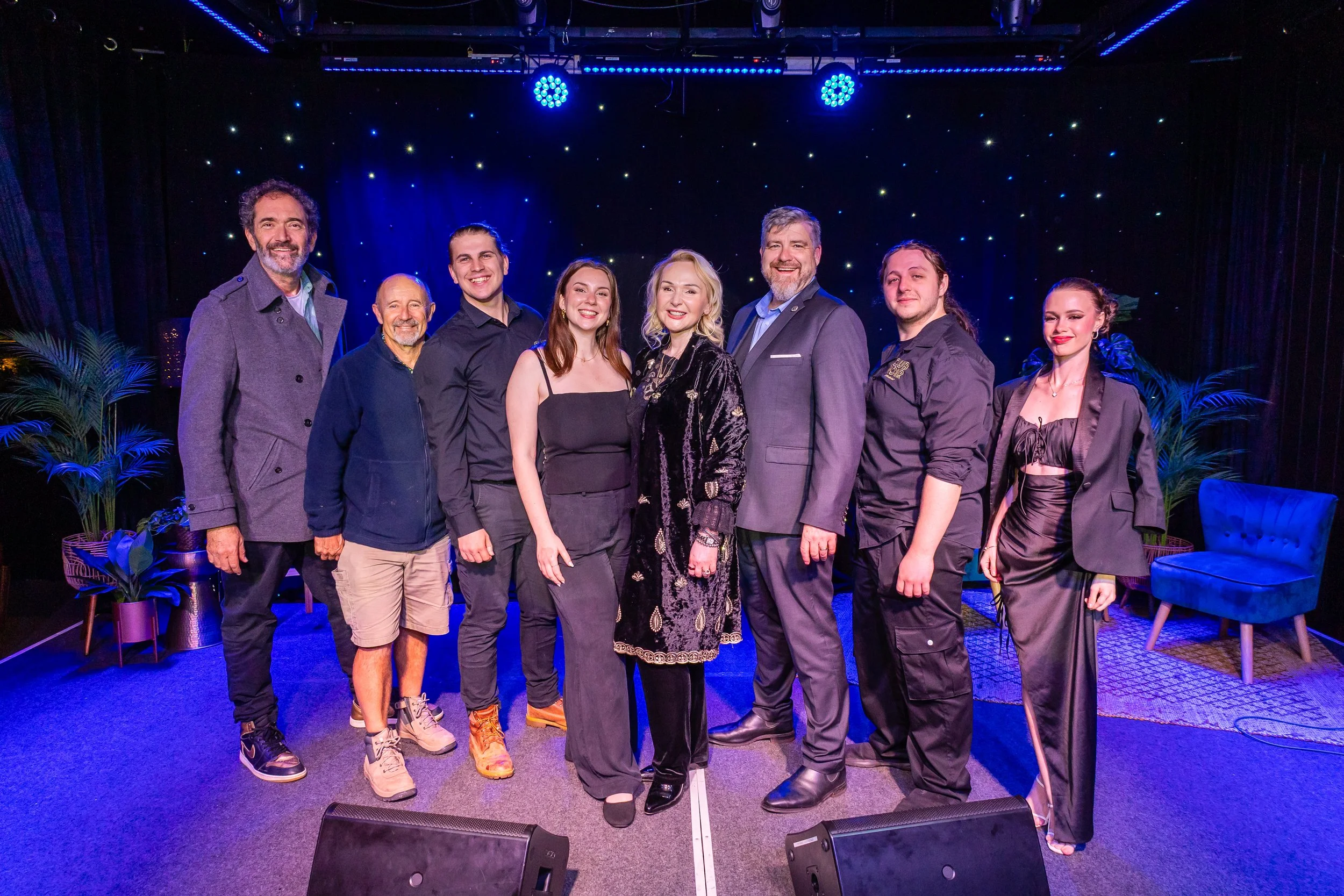 The Performance Studios Team Poses with singer Darren Percival after the Rise Up Junior Grand Finals