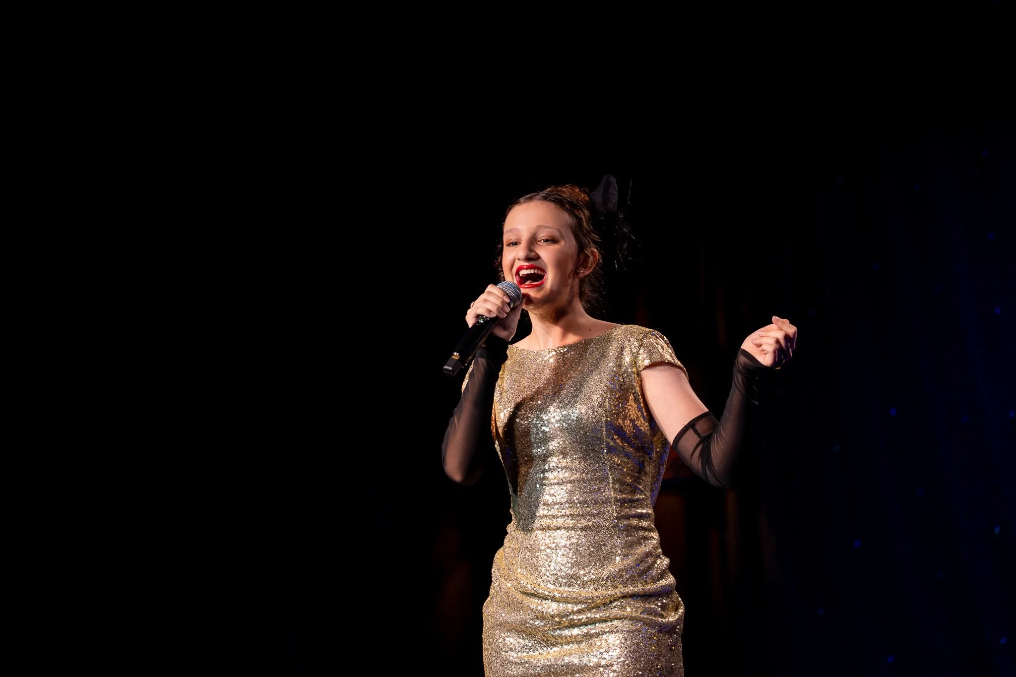 Performance Studios Student Mary Borg performs a Jazz-style version of "Walking on Sunshine" by Katrina and the Waves.