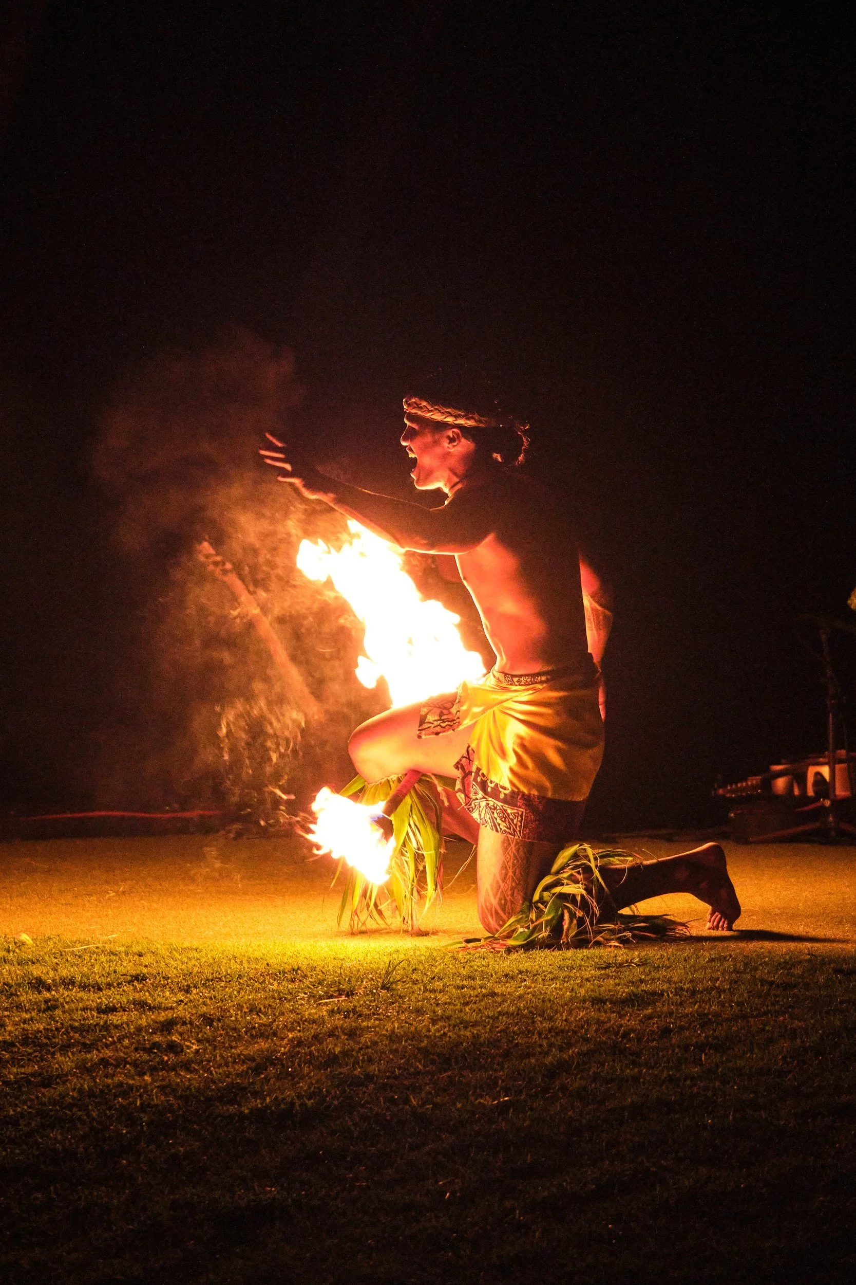 Fire dancer performing at the Andaz luau, Orange County