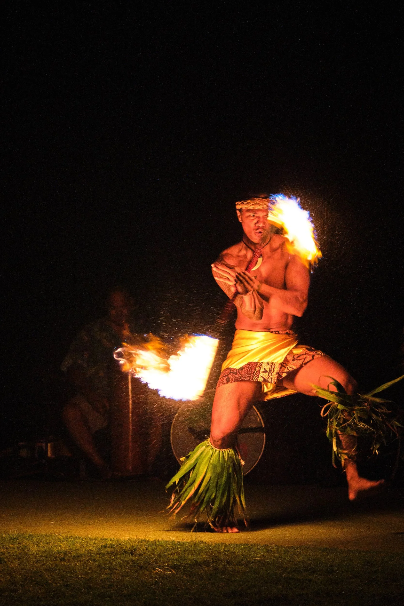 Fire dancer performing at the Andaz luau, Orange County