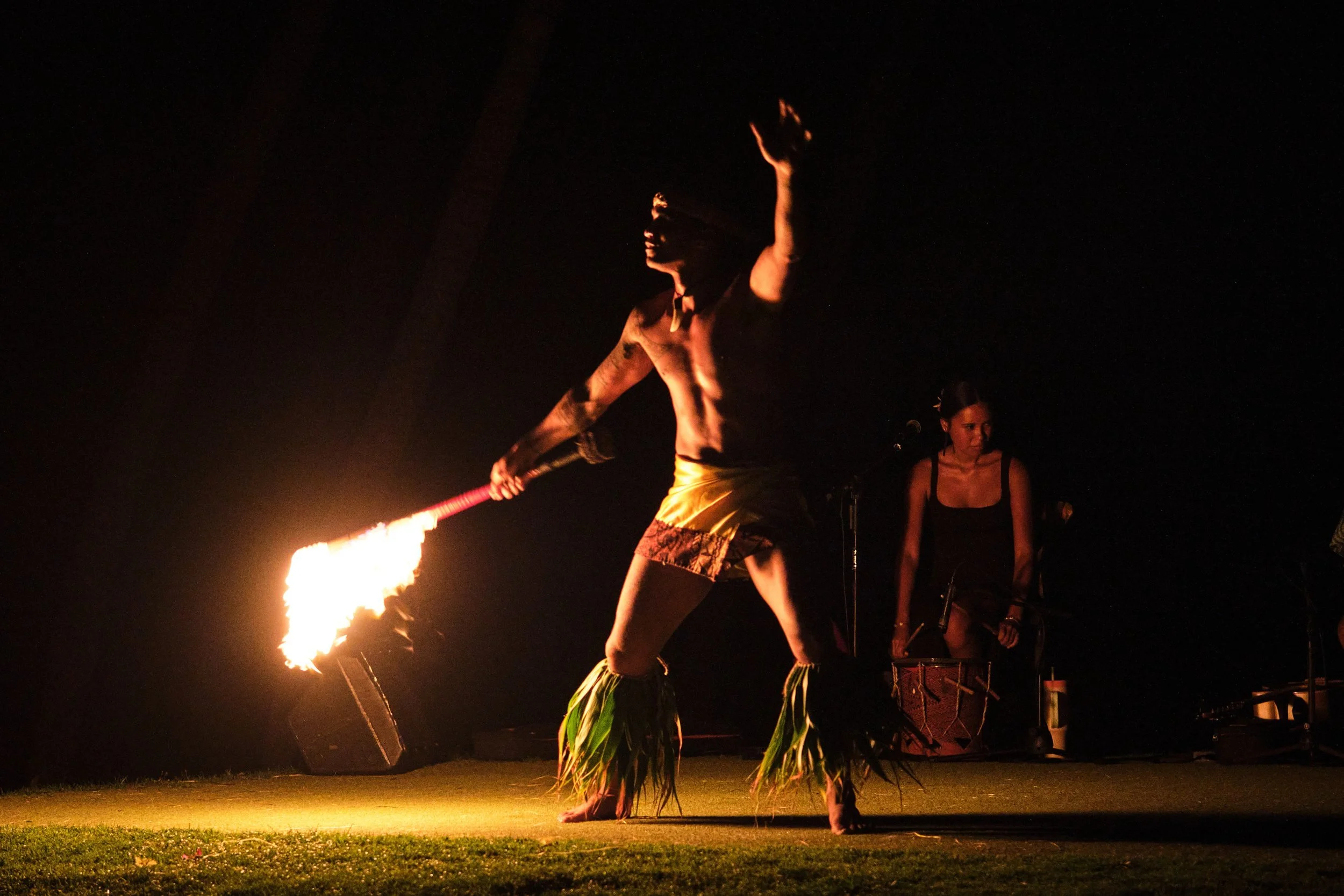 Fire dancer performing at the Andaz luau, Orange County