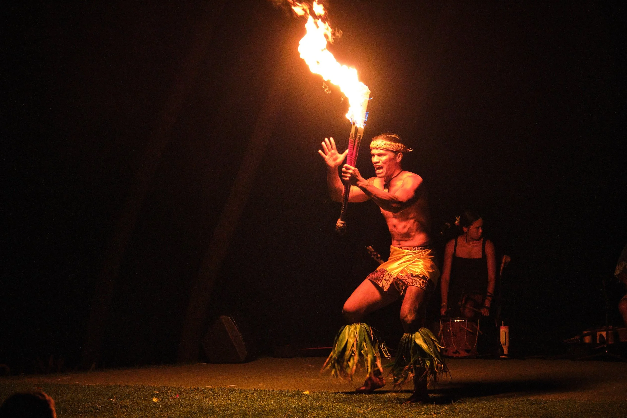 Fire dancer performing at the Andaz luau, Orange County