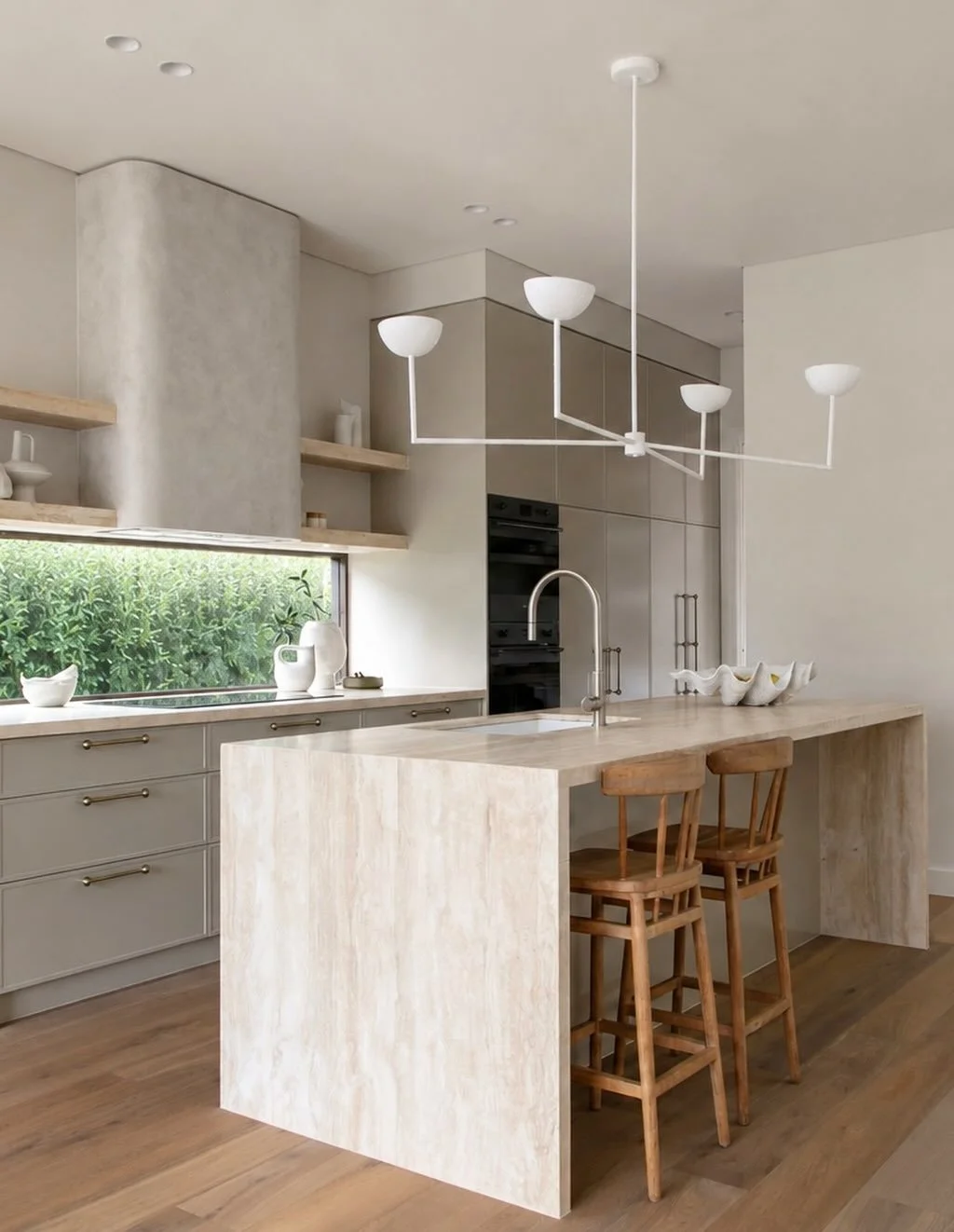 Project Caronia ✨ We love the silver vein travertine bench tops and floating shelves within this timeless kitchen