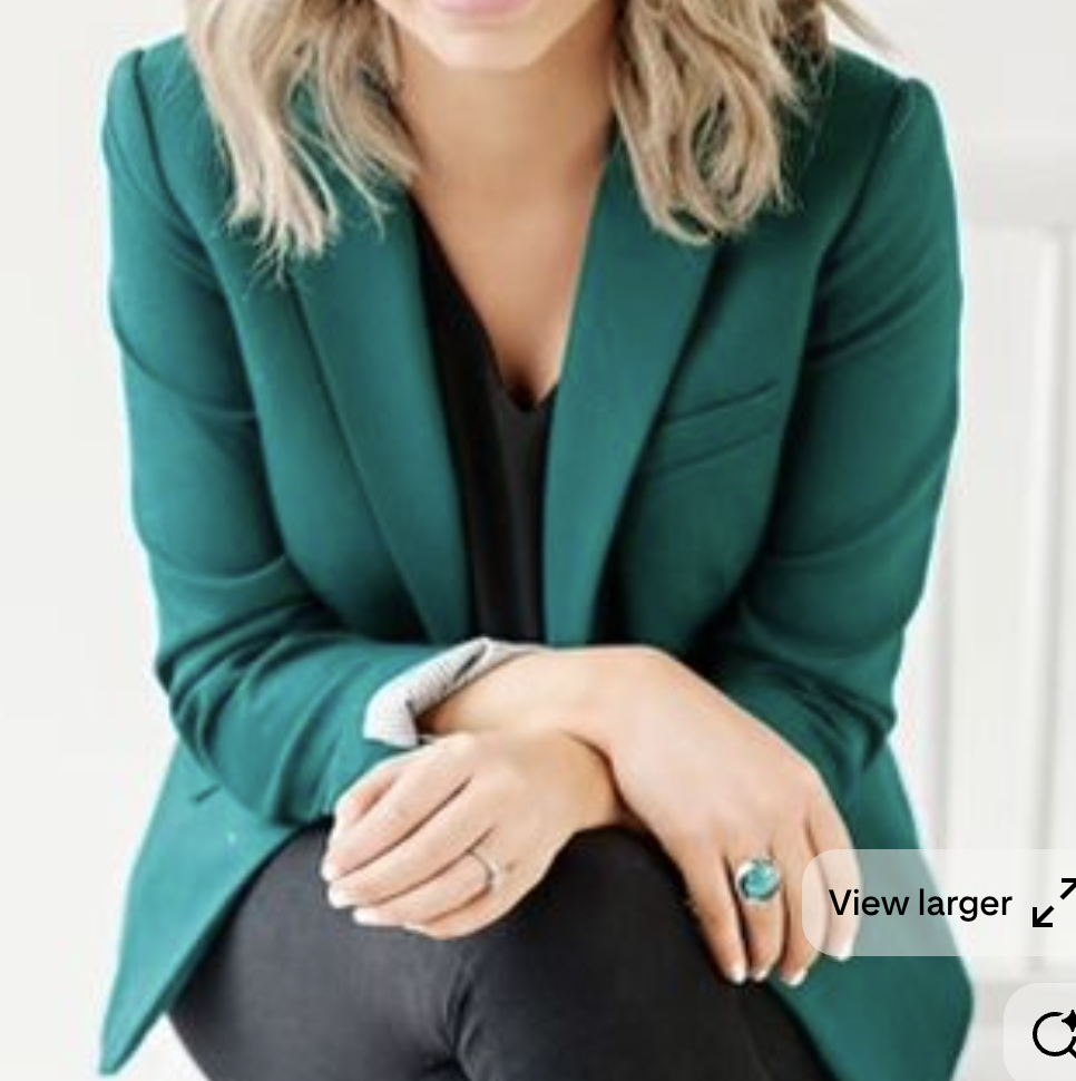 example outfit, person wearing a green blazer, black pants and black shirt
