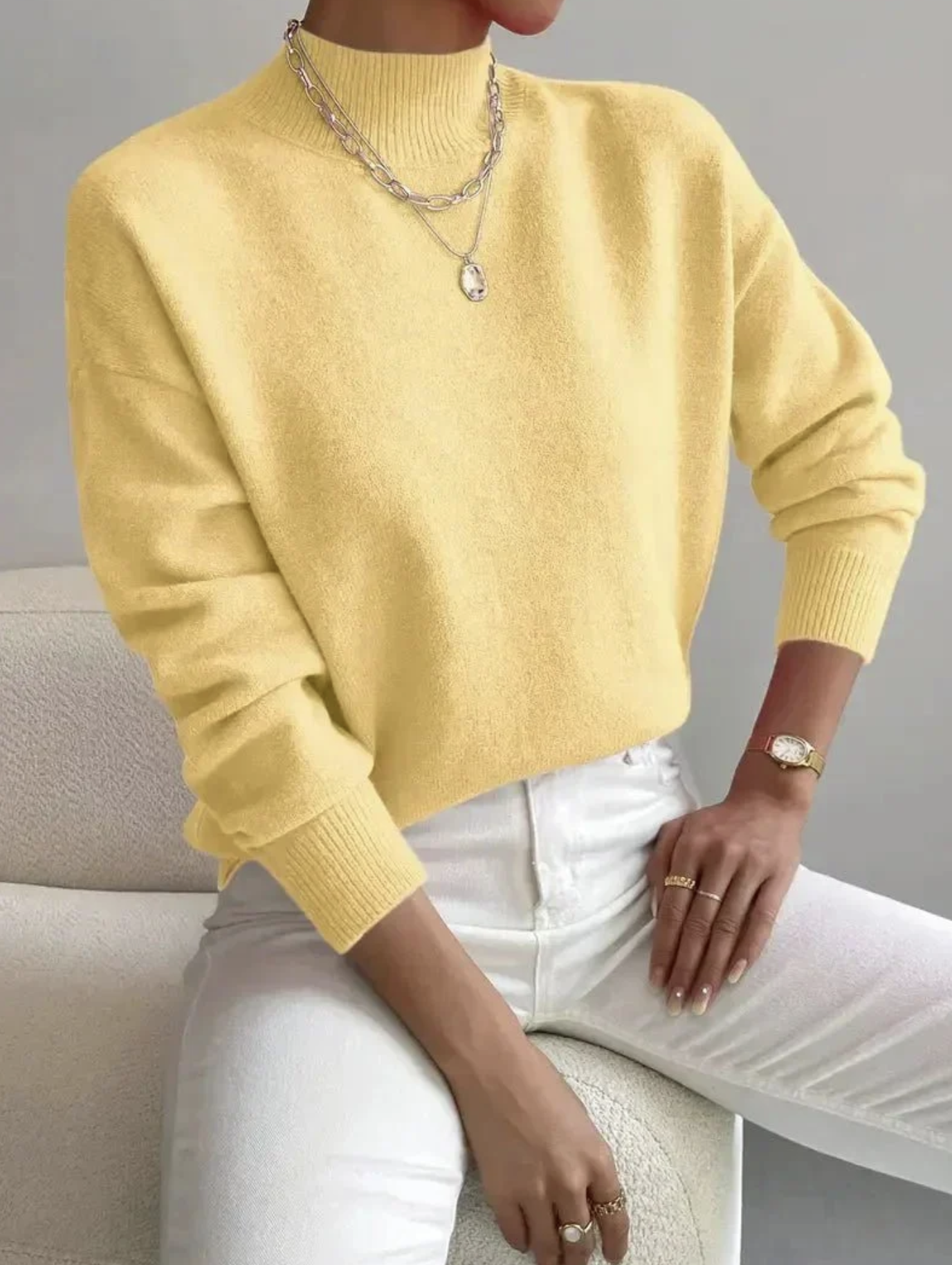 example outfit, canary yellow loose turtleneck knit sweater and white chino pants