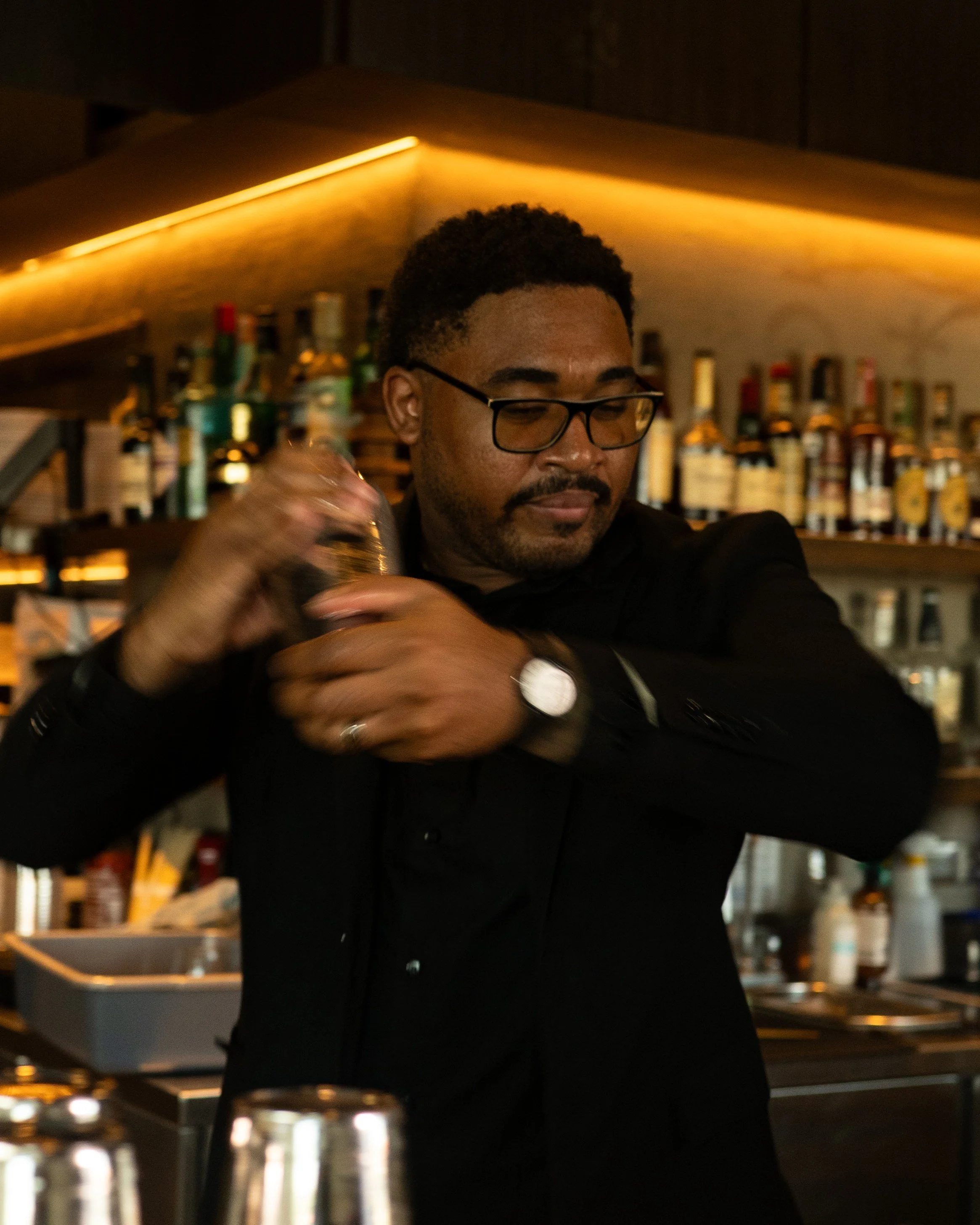 Management team at Zoto Sushi Sarasota, providing elevated Japanese dining service.