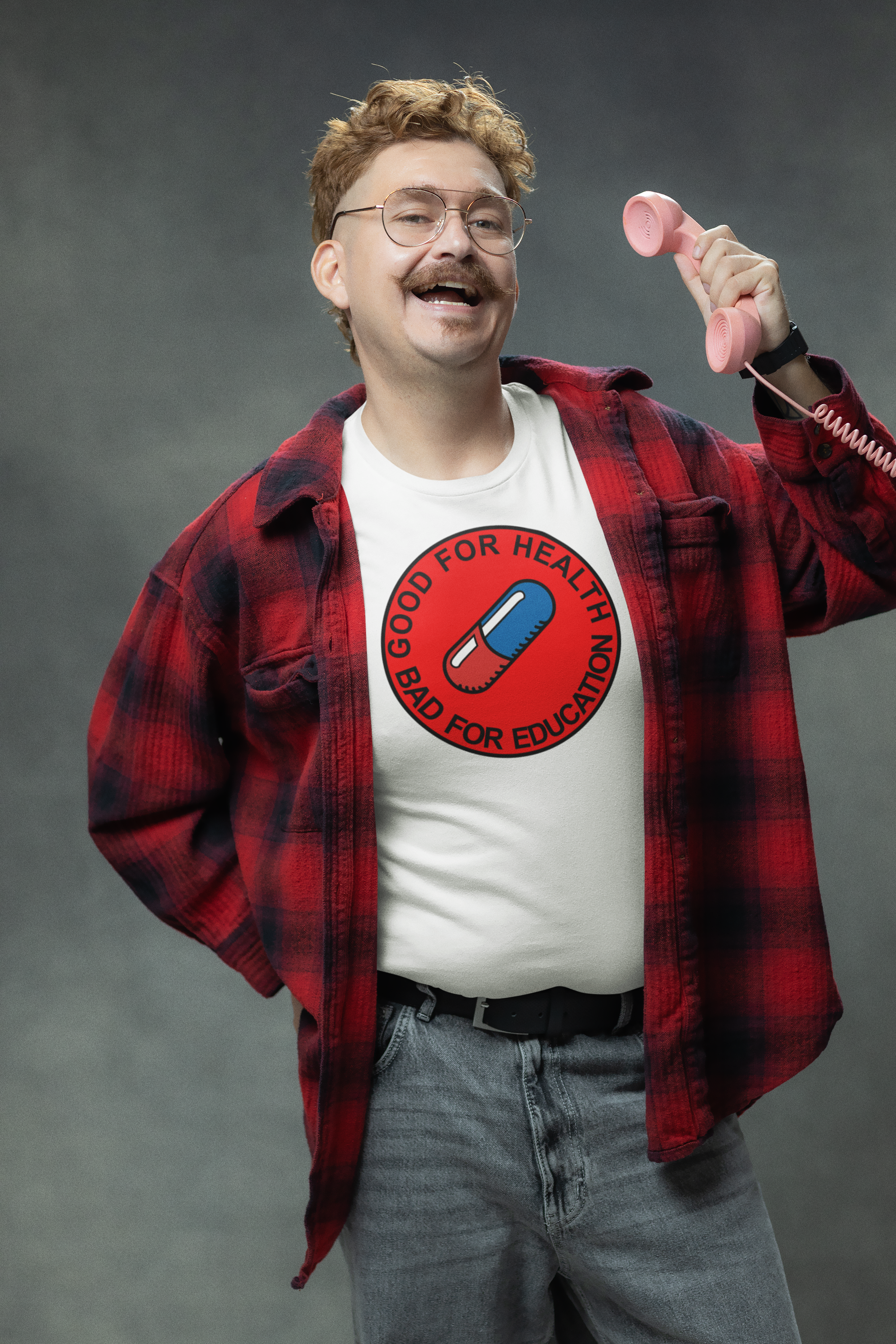 bella-canvas-t-shirt-mockup-of-a-man-posing-with-a-retro-telephone-m36947.png