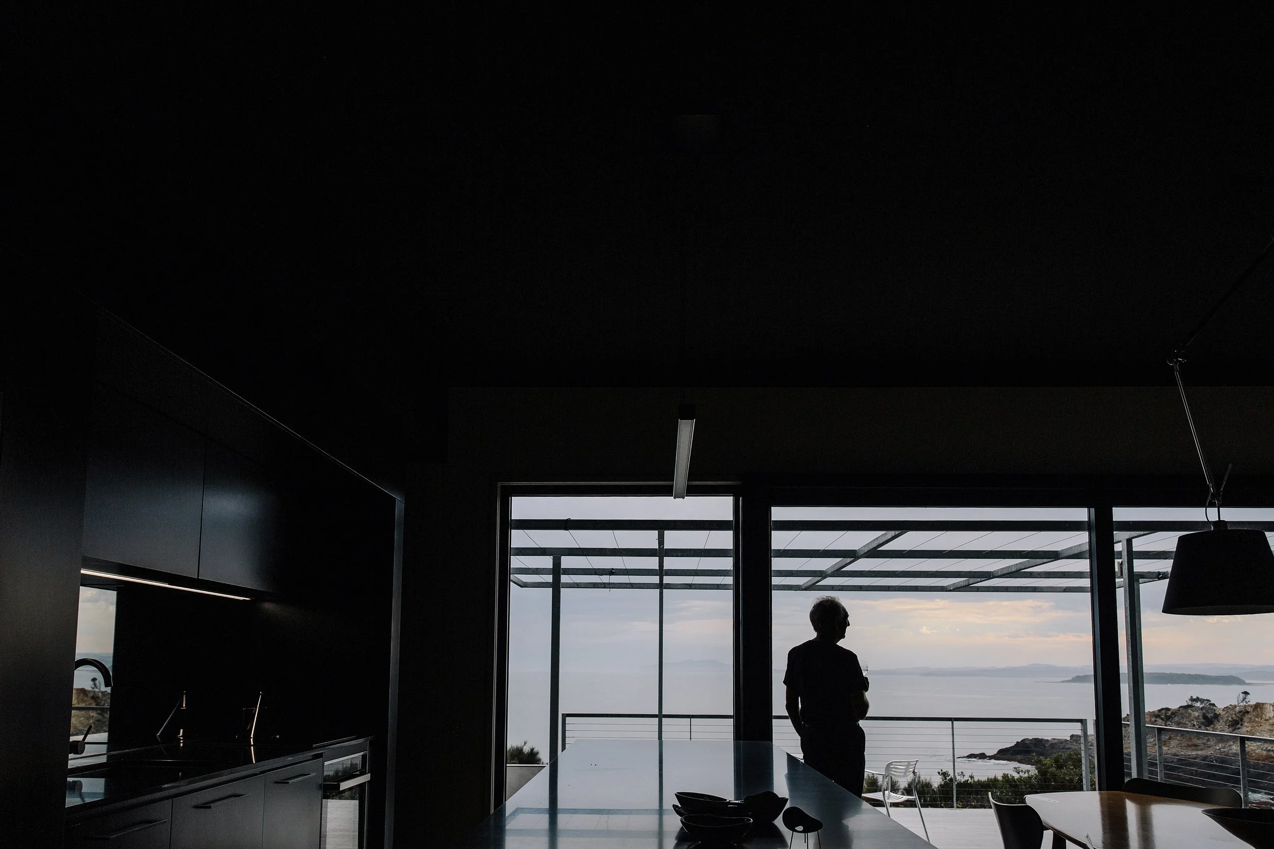 Spectacular water views through full-height windows in open-plan granny flat for Bayview residents