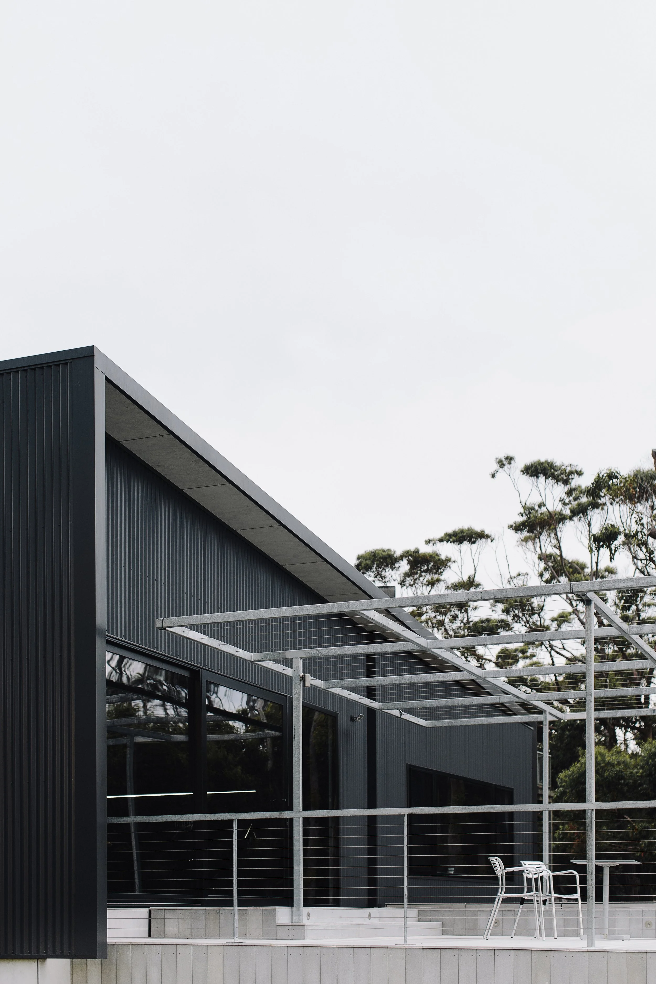 Modern steel-clad granny flat in Bayview with covered patio and native tree surrounds