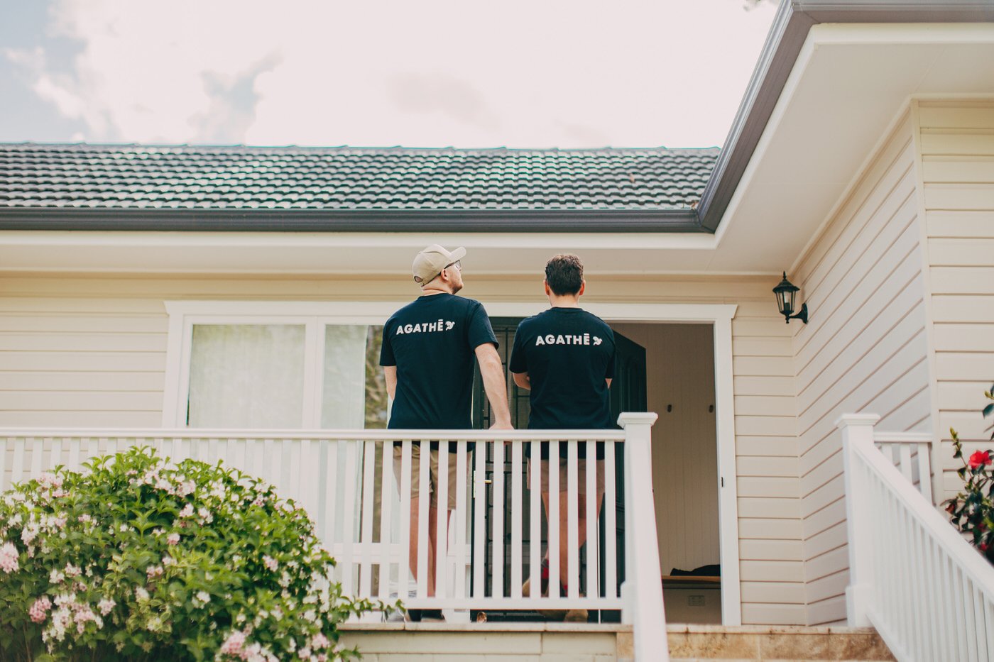 AGATHĒ builders reviewing completed custom extension project in Westleigh, demonstrating quality craftsmanship and professional collaboration