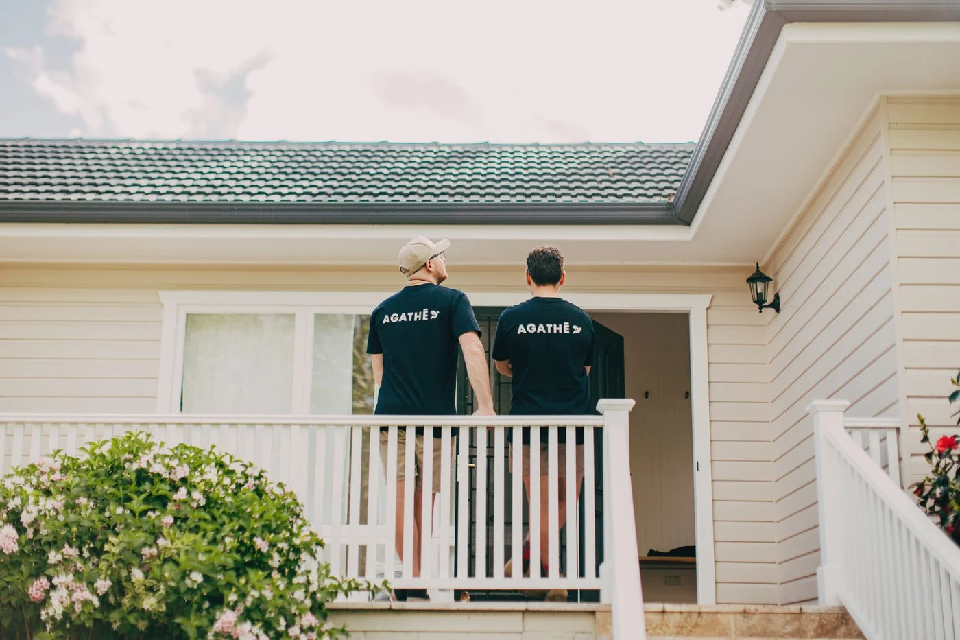 AGATHĒ builders reviewing completed custom extension project in Baulkham Hills, demonstrating quality craftsmanship and professional collaboration