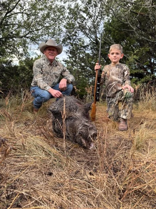 Granddad and grandson morning hunt.