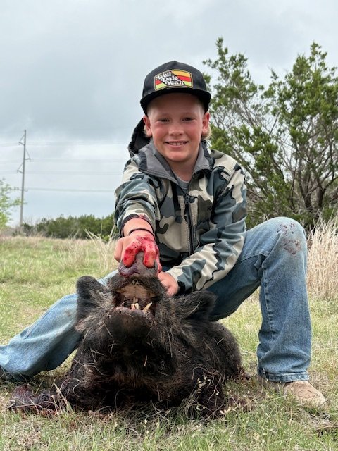 Rain coming in but still able to get a hog shot from the blind