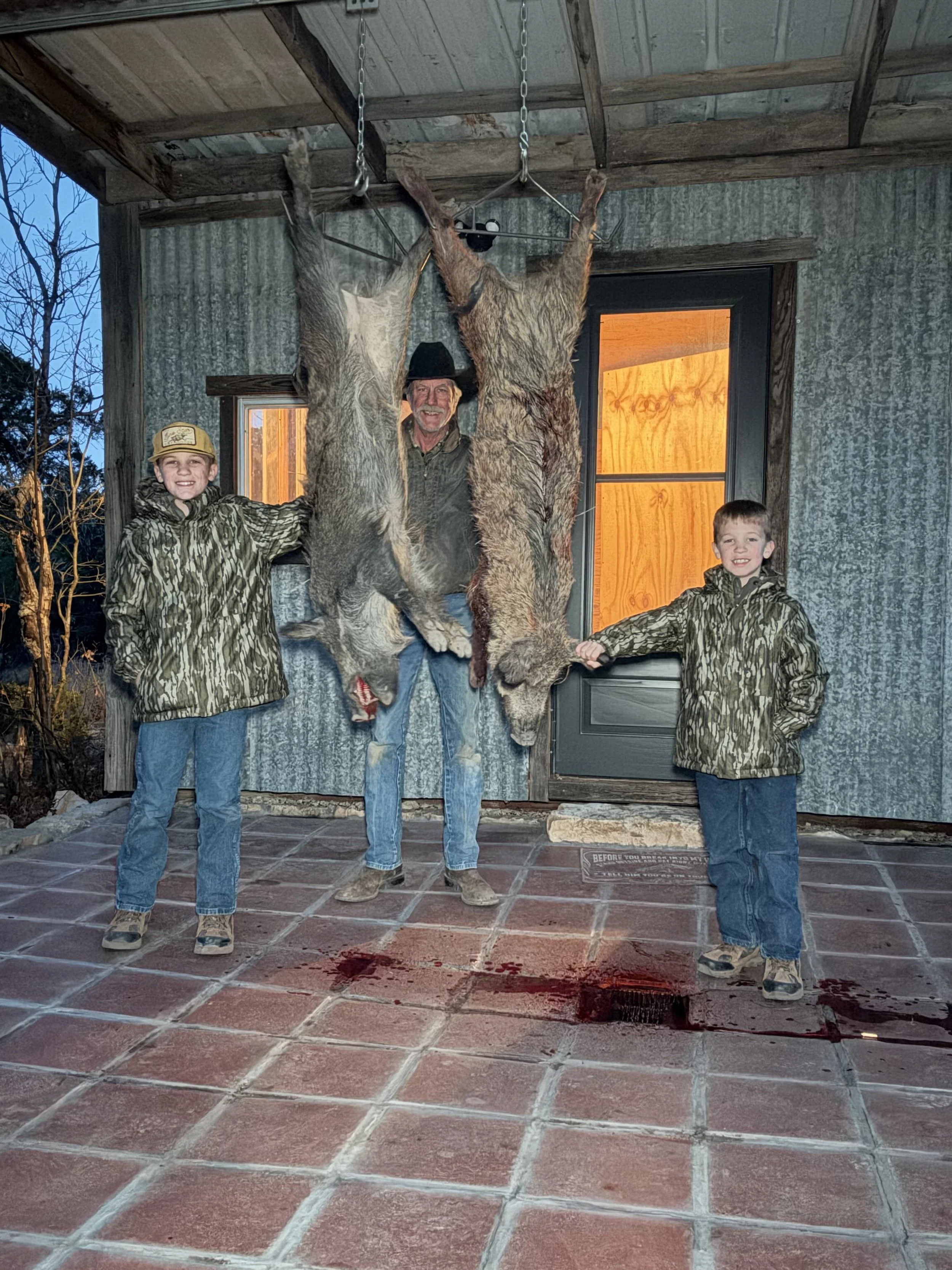 Outfitter Robert and young Alabama hunters