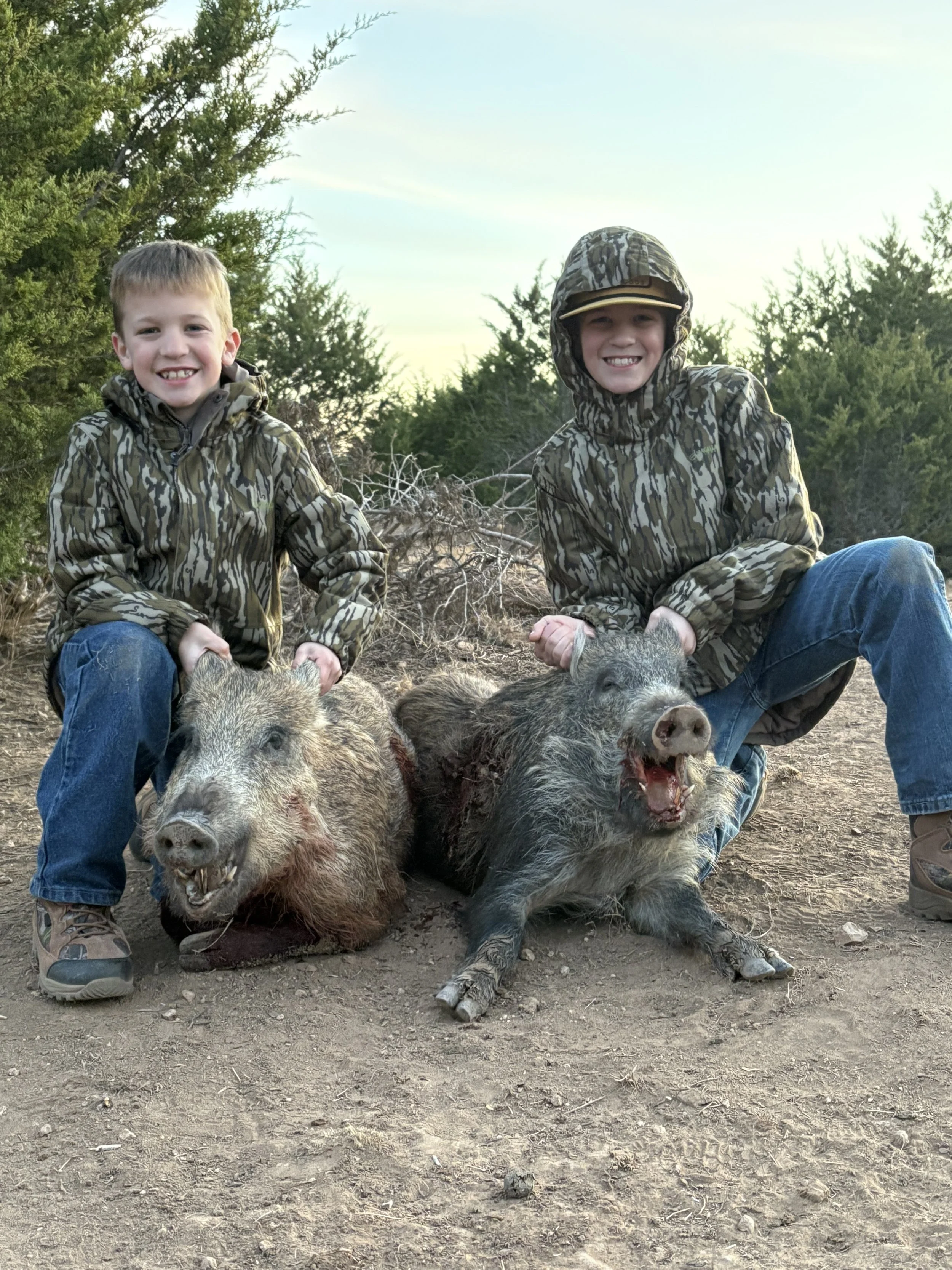 Young hog hunters from Alabama