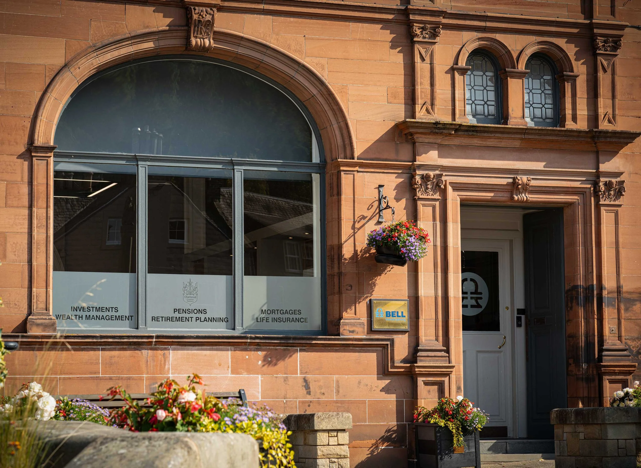 Front of Bell Financial planning offices in market square Melrose.