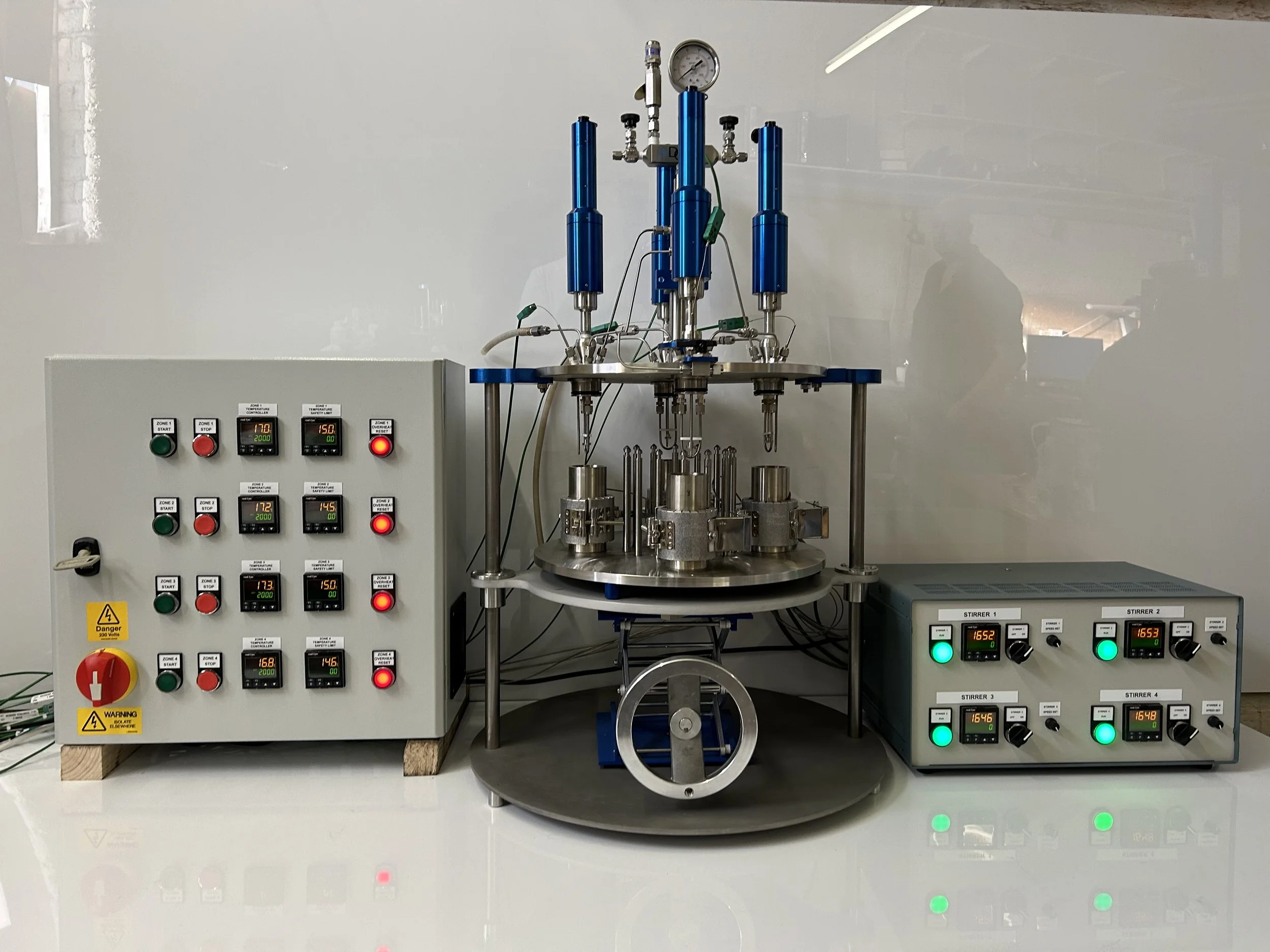 Standard multicell MK III with customisation.
4 x 100ml cell volume. Individual overhead, motor driven, variable speed, magnetic drive for high viscosity agitation. Individual heater and control of each cell. Common Internal cooling loop of each cell