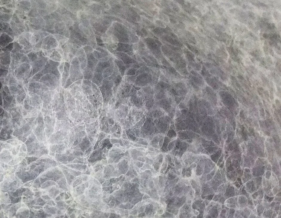 Abstract patina texture in silver and grey tones on metal surface