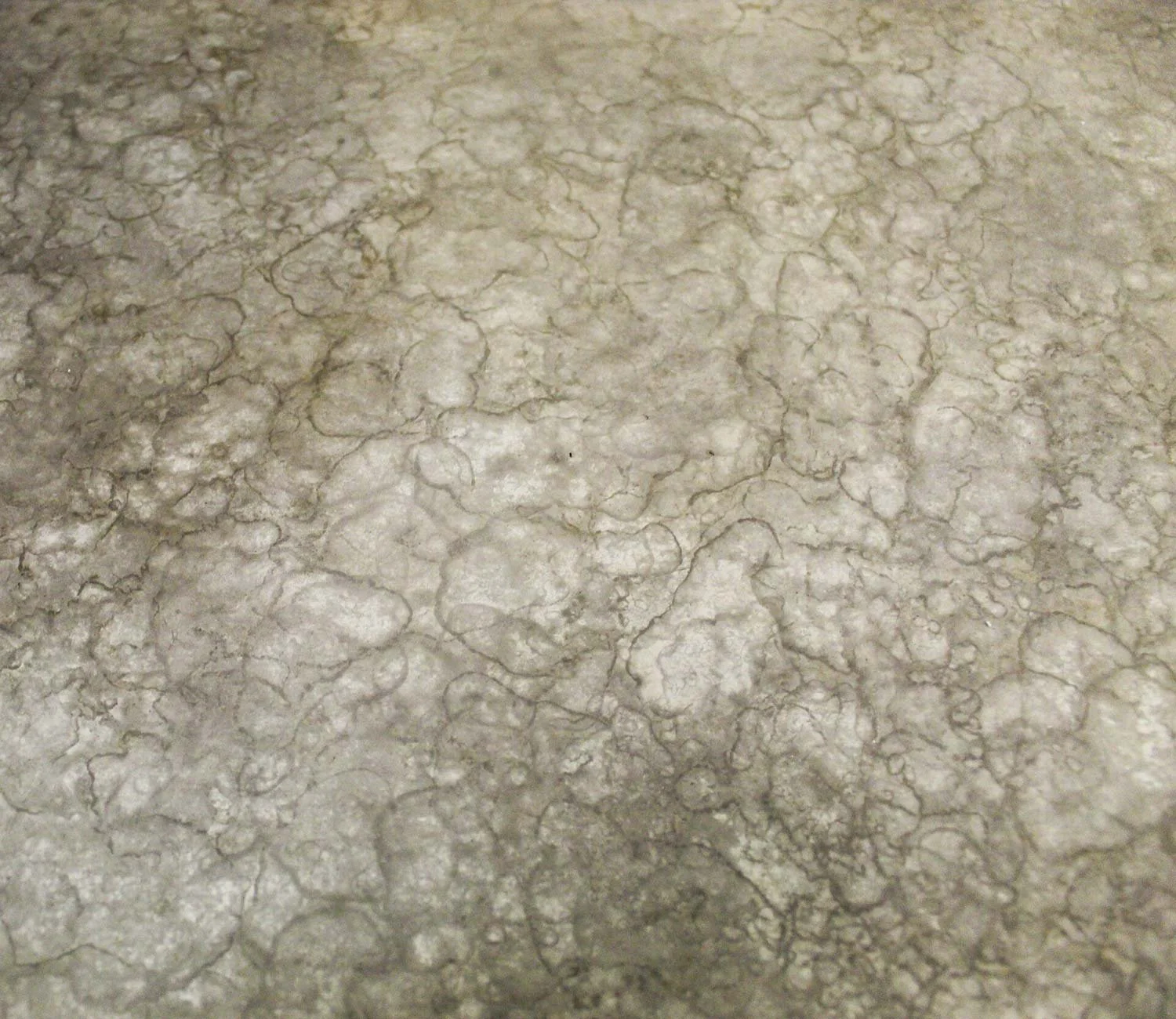 Abstract water like patina texture in silver and grey tones on metal surface