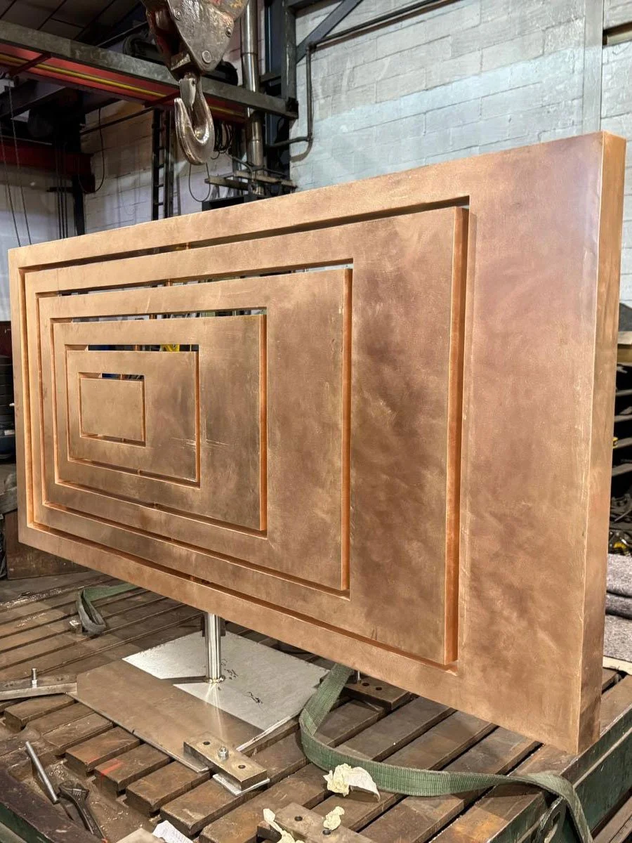 Process shot of Ivan Black sculpture during finishing