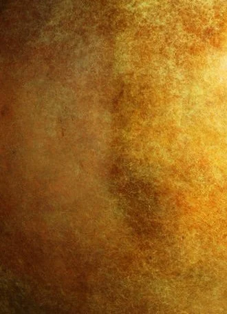 Abstract patina texture with layered yellow and brown tones on metal surface