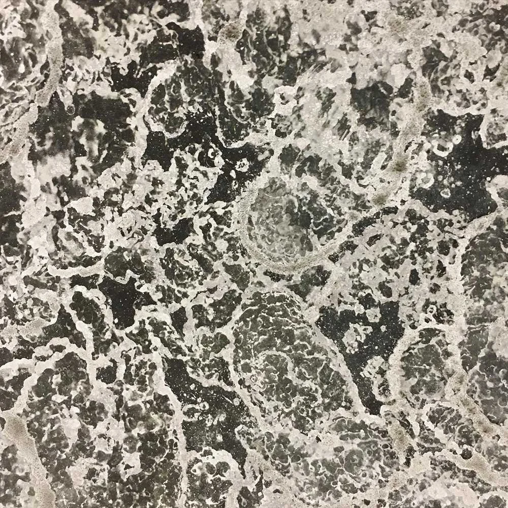 Abstract marble like patina texture in white, grey and black tones on metal surface