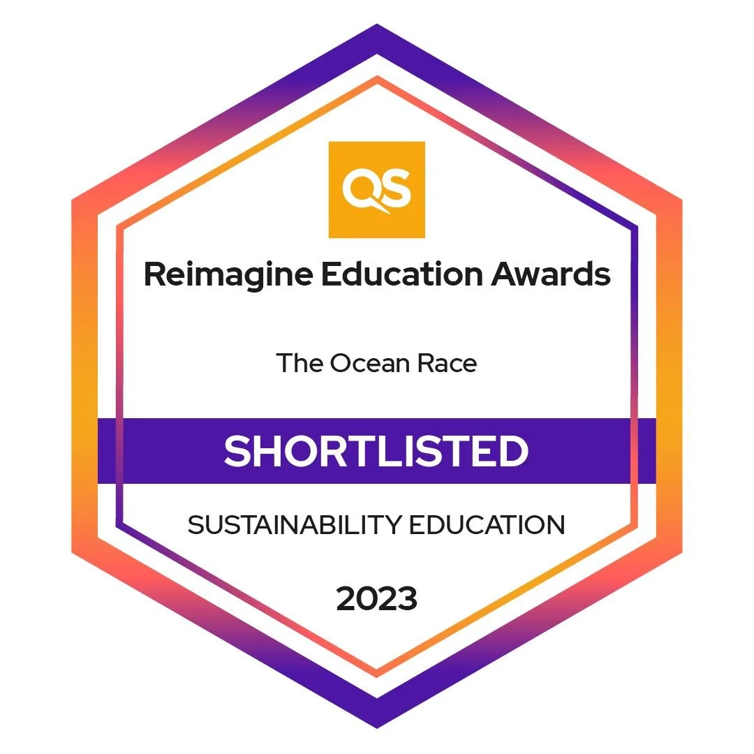 Reimagine Education Awards badge with a hexagon design, featuring the QS logo at the top, and text indicating the award is for 'The Ocean Race,' shortlisted in sustainability education for 2023.