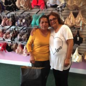 Two women together inside the boutique