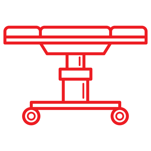 Red outline illustration of a surgery table with wheels.