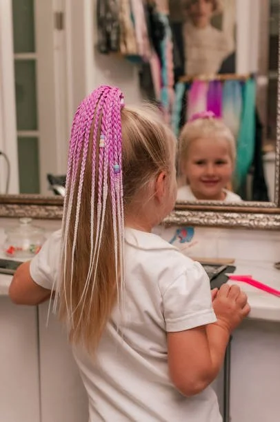 Child wearing braid ponytail accessory Ireland